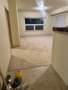 condo unit showing new tile paint trim and carpet