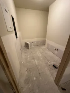 condo unit after water damage and demo drywall underway