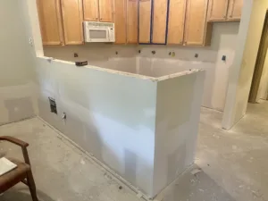 condo unit after water damage and demo drywall underway