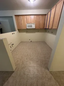 condo unit after water damage and demo, drywall finished and painting and tile