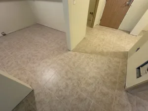 condo unit after water damage and demo, drywall finished and painting and tile